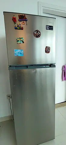 Silver Double-Door Refrigerator - Top Freezer, Good Condition