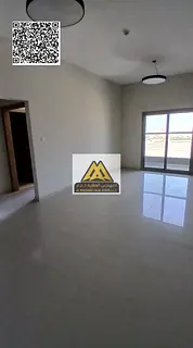 A luxury 1-bedroom apartment with a living room for annual rent in one of the finest new towers in A