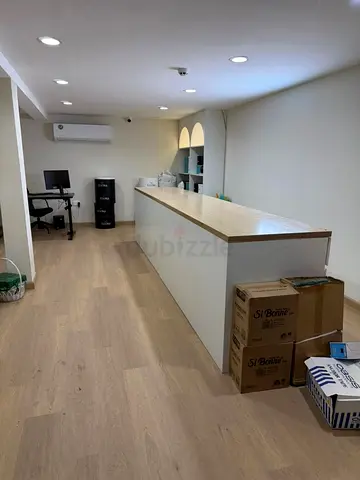 Long white reception counter / retail display counter