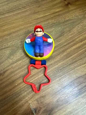 Small Mario spinning rattle toy / keyring figure