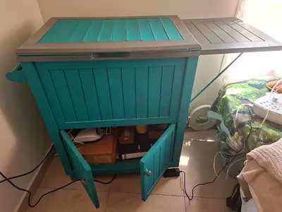 Cute, clean, very useful cabinet for barbeque