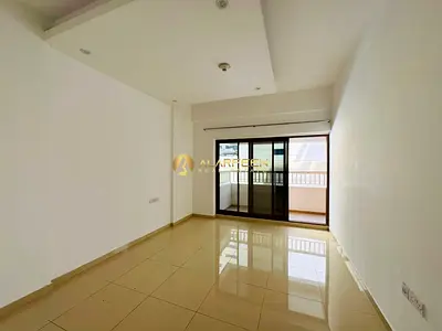 Unfurnished 1BR +Maid | Laya Residences | Balcony