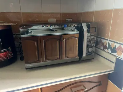 Panasonic Stainless Steel Microwave Oven - Good Working Condition