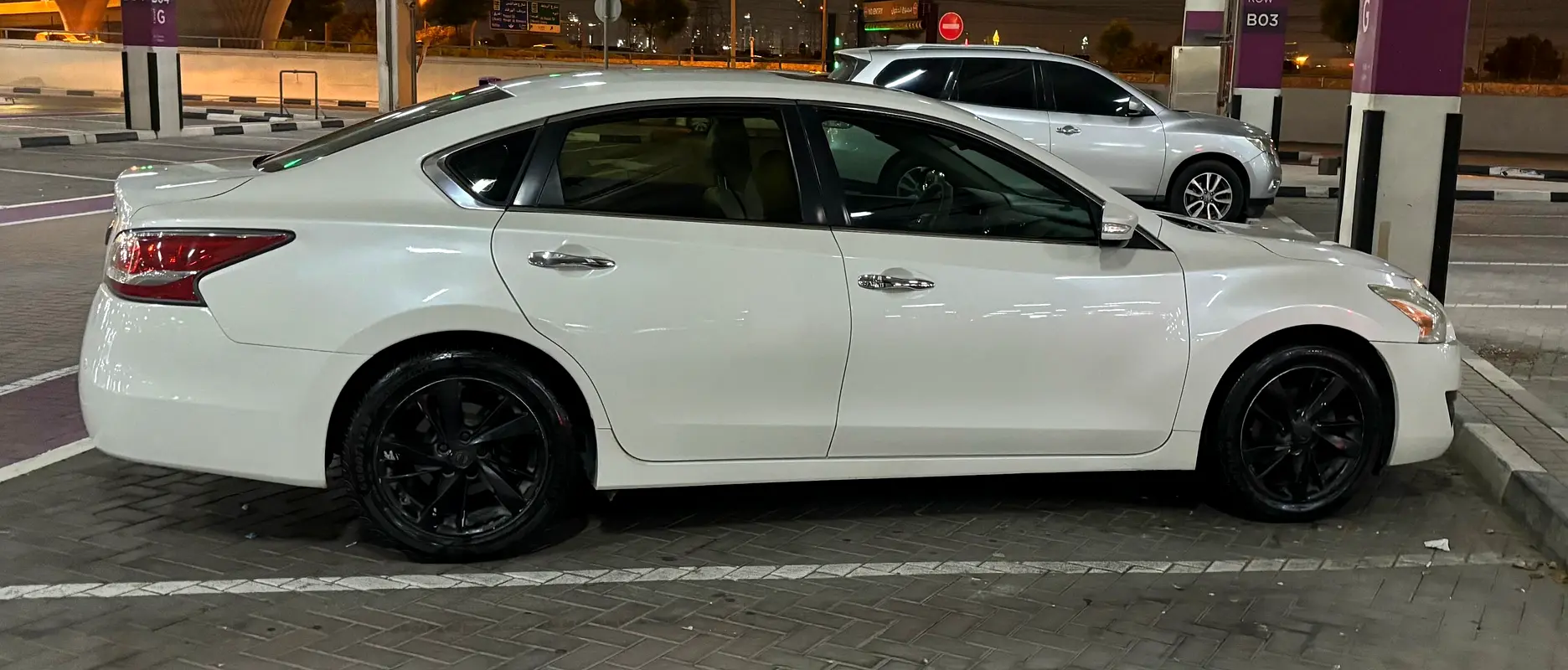 Nissan Altima 2014 — photo 1 of 3