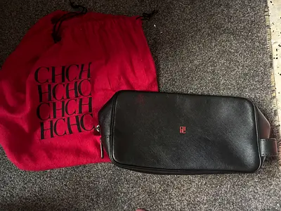 Carolina Herrera black leather dopp kit / toiletry bag with dust bag