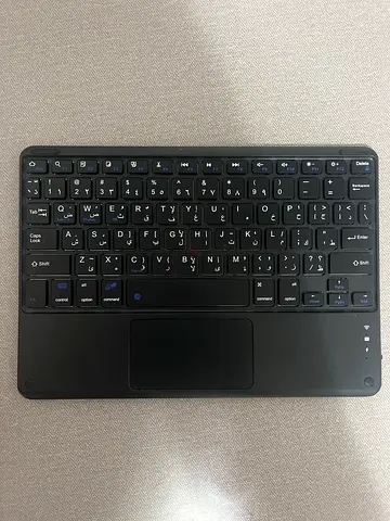 Compact Bluetooth Keyboard with Integrated Touchpad (Used)