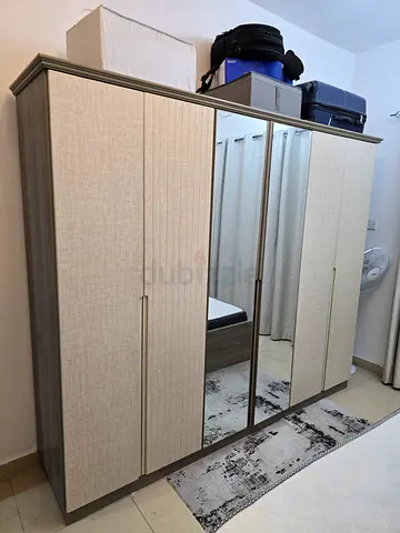 1 yr Furniture - 6 Door Wardrobe, King Size Bed with side tables, Dresser with mirror. Grey finish m