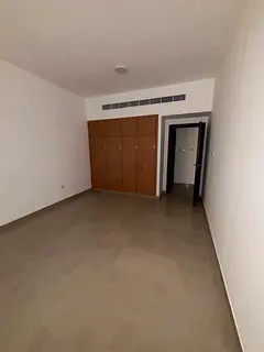 Balcony + luxury finishing + 2 kitchens + 3 baths, 2BR + hall for rent in Al Nahda, spacious layout,
