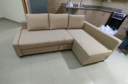 Ikea L Shape Sofa cum bed with big storage in L