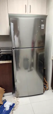 Silver Double-Door Refrigerator - Good Working Condition
