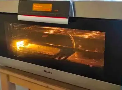 a Miele H 5981 BP built-in oven. It is a premium 90 cm oven with multiple cooking functions,
