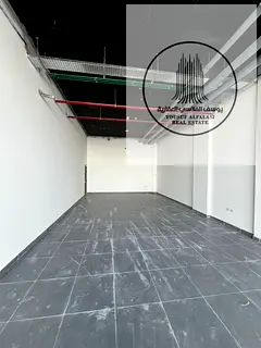 Shop 900 sqft Ajman industrial main road high traffic prime