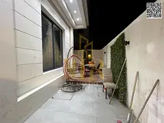 Two-story villa in Al Yasmin, 5 bedrooms, at a special price including electricity, water, and air c