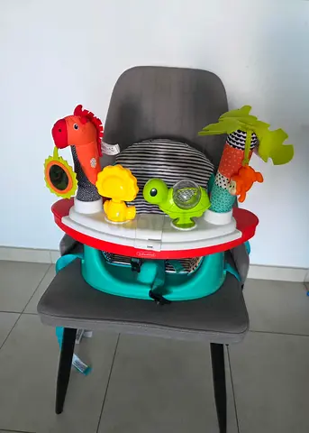 Baby activity seat with toy tray (used) — compact and portable