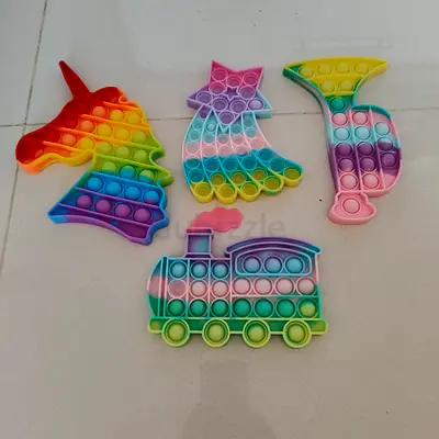 Set of 4 Rainbow Pop It Fidget Toys (Unicorn, Star, Horn, Train)