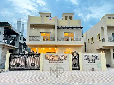 Villa for sale in Ajman, Al Helio area. 5 master bedrooms, majlis, living room, and maid's room. Freehold ownership for all nationalities. Bank financ