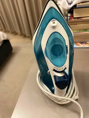 Electric Iron With Steamer