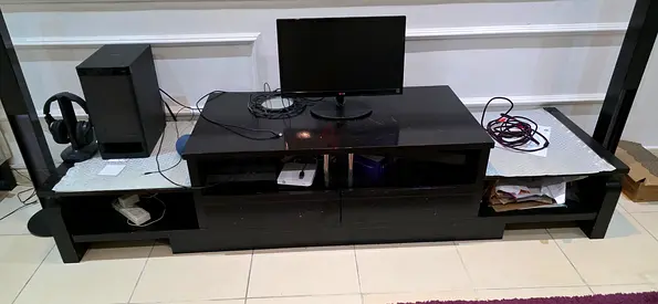 Long black TV entertainment unit with shelves and drawers - good used condition