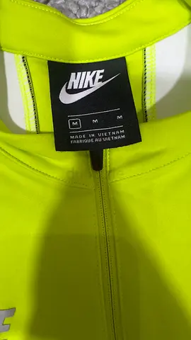 Nike neon yellow zipper athletic top, size M