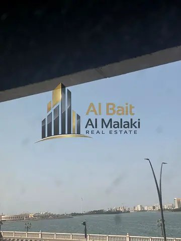 Shop for rent in Al Qasba Area 870 sq Two months free Air conditioning free Prime location with a view of Khalid Lake and the lake corniche