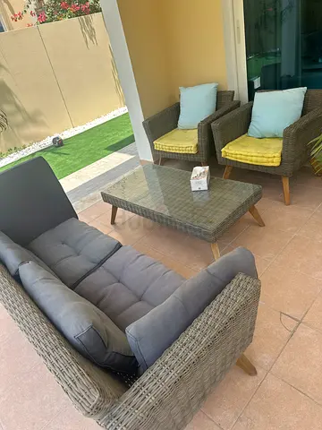 Outdoor rattan sofa set with glass coffee table — good condition