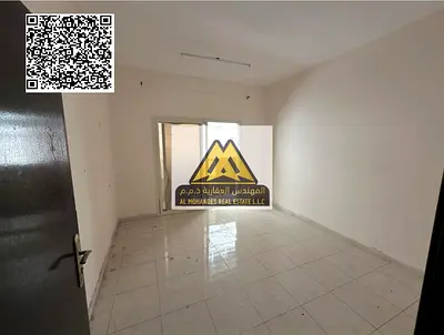 A luxury 1-bedroom apartment with a living room for annual rent in Al Jurf 2 – Ajman, second tenant, featuring a master bedroom, 2 bathrooms, and a ba