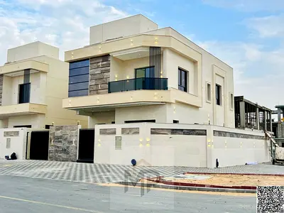 Villa (corner) for sale in Ajman | Al Helio 2 area | 5 rooms, majlis, 2 halls and roof | Freehold ownership for all nationalities | Price includes reg