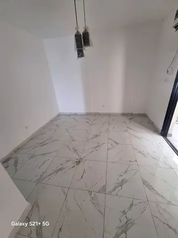 Apartment for rent in Sharjah Al Musalla 3 bedrooms hall 2 bathrooms 3 balconies window AC close to services for bachelors company contract 55000 AED