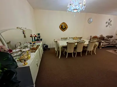 8 seater sofa set and dining table set with 8 upholstered chairs and sideboard - good condition.
