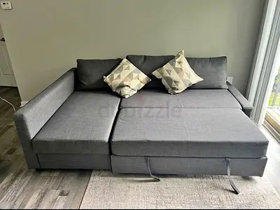 Grey L-shaped Sofa Bed with Storage - Good Condition