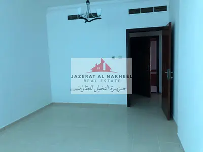 Available two-bedroom apartment with a living room for annual rent in Al Taawun.