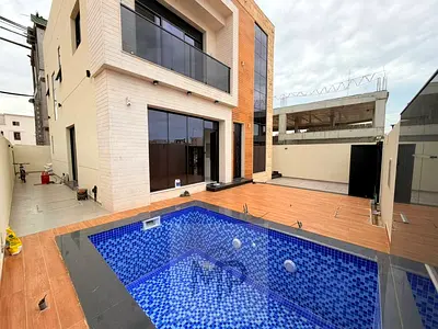 Two-story villa with a rooftop terrace and swimming pool, priced inclusive of registration and ownership fees, located on the main street and ready fo