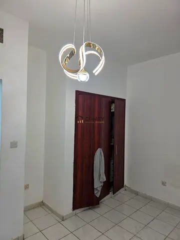 Unfurnished Studio | England Cluster Y-17 | Balcony | Community View