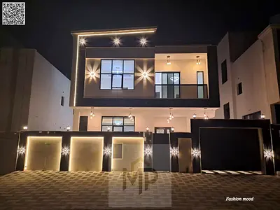Villa| Ajman| al helio2 area| 6 master rooms, majlis, 2 halls, roof, maid room| freehold| the price including registration fees and central A\C.