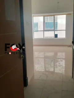 Semi-detached kitchen/studio apartment for annual rent in Ajman, Pearl Towers, Al Rashidiya 1
