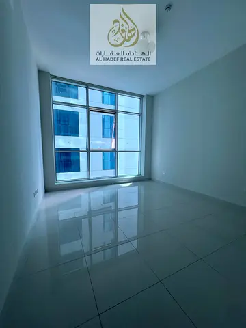 Annual Rental Apartment in Sharjah Al Khan Two Bedroom Hall Near Corniche Free Parking Flexible Payment 4 or 6 Cheques Rent 55,000 AED
