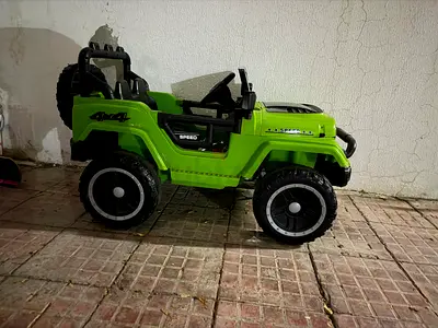 Green 4x4 Battery-Powered Ride-On Jeep for Kids