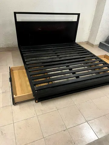 Black bed with storage drawers