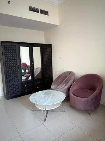 Dark Wood Wardrobe with Mirrored Doors + Velvet Accent Chairs and Coffee Table
