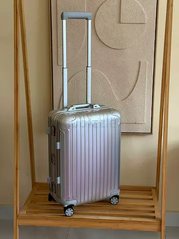 Rimowa Silver Hard Shell Carry-On Roller Luggage with Telescopic Handle