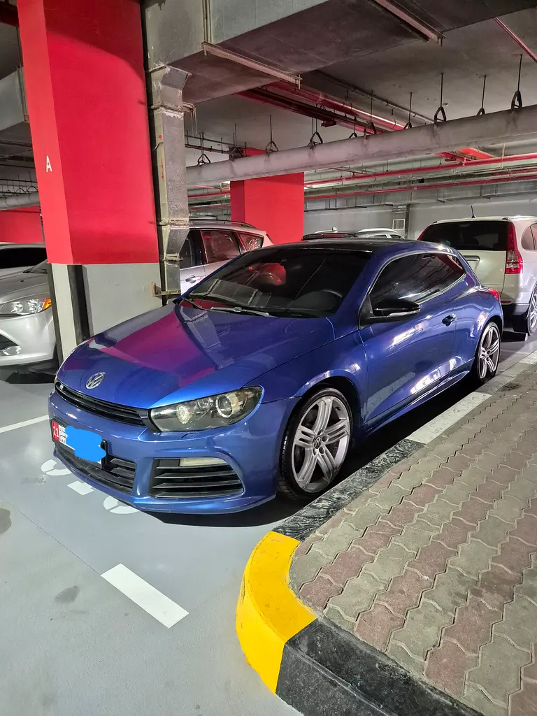 Volkswagen Scirocco 2014 — photo 1 of 5