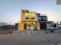 Lowest price villa in Ajman, including registration and ownership fees, on a main street and close t