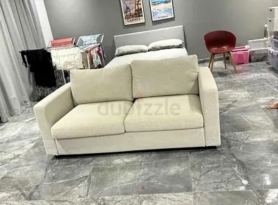 Beige 2-seater Sofa - Compact and Comfortable