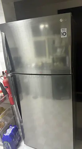 LG Stainless Steel Top Freezer Refrigerator - Good Condition