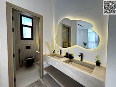A golden opportunity: a villa on a street and alley, two floors and a roof, with a modern design and