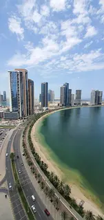 🏡 For Sale: 2-Bedroom Apartment with Stunning Front Lake View in Al Khan Area 🏡