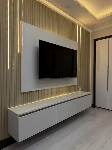 Modern Wall-Mounted Entertainment Unit with TV Panel and LED Lighting
