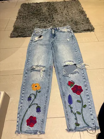 Light wash denim jeans, size label visible - PullBear style size 24-25