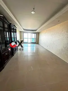 For sale: Two-bedroom apartment with a living room and maid's room in Ajman Corniche. Prime loca