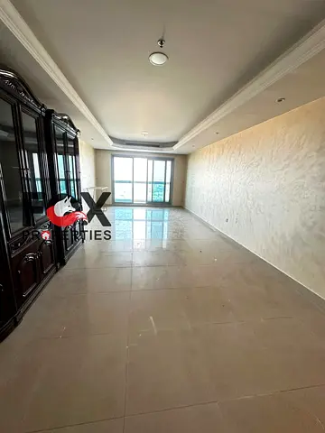 For sale: Two-bedroom apartment with a living room and maid's room in Ajman Corniche. Prime location directly on the Corniche – direct open view.